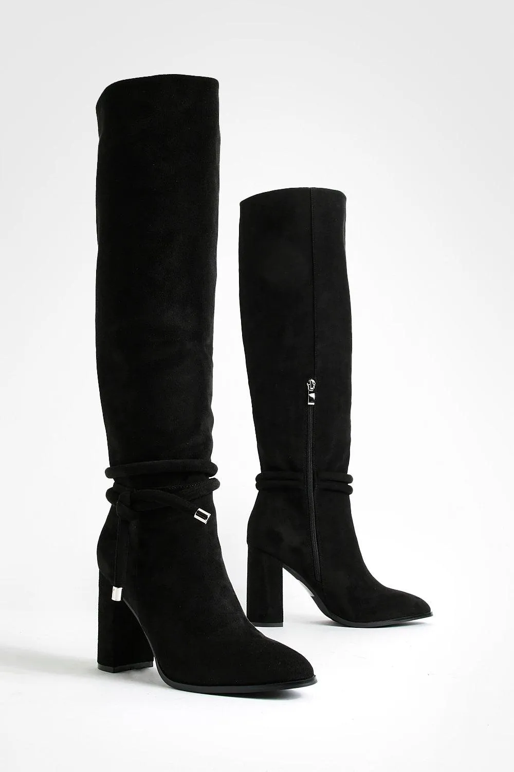 Boots with tied high heels